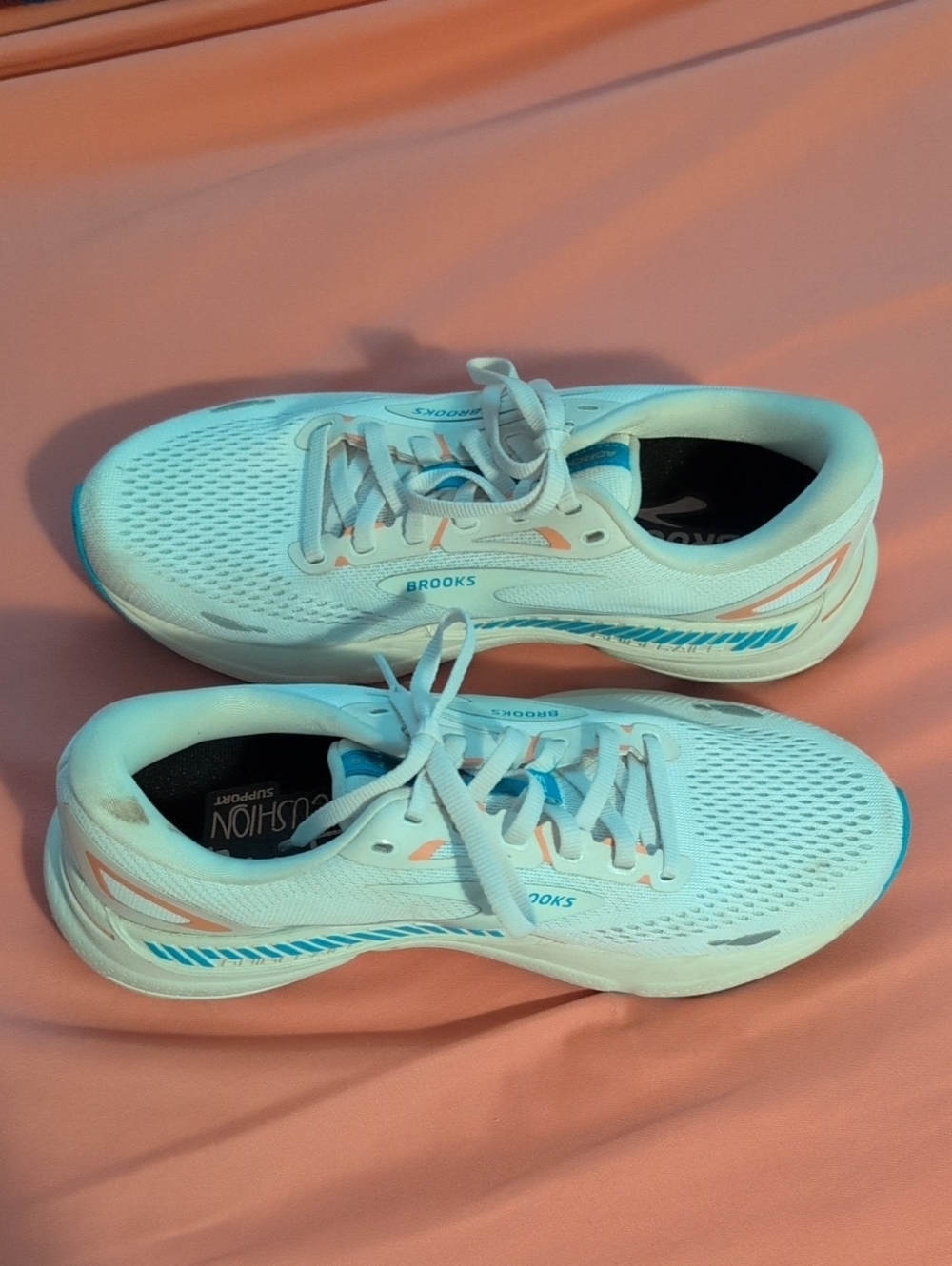 Brooks Women's White Running Shoes with Light Blue and Coral Accents